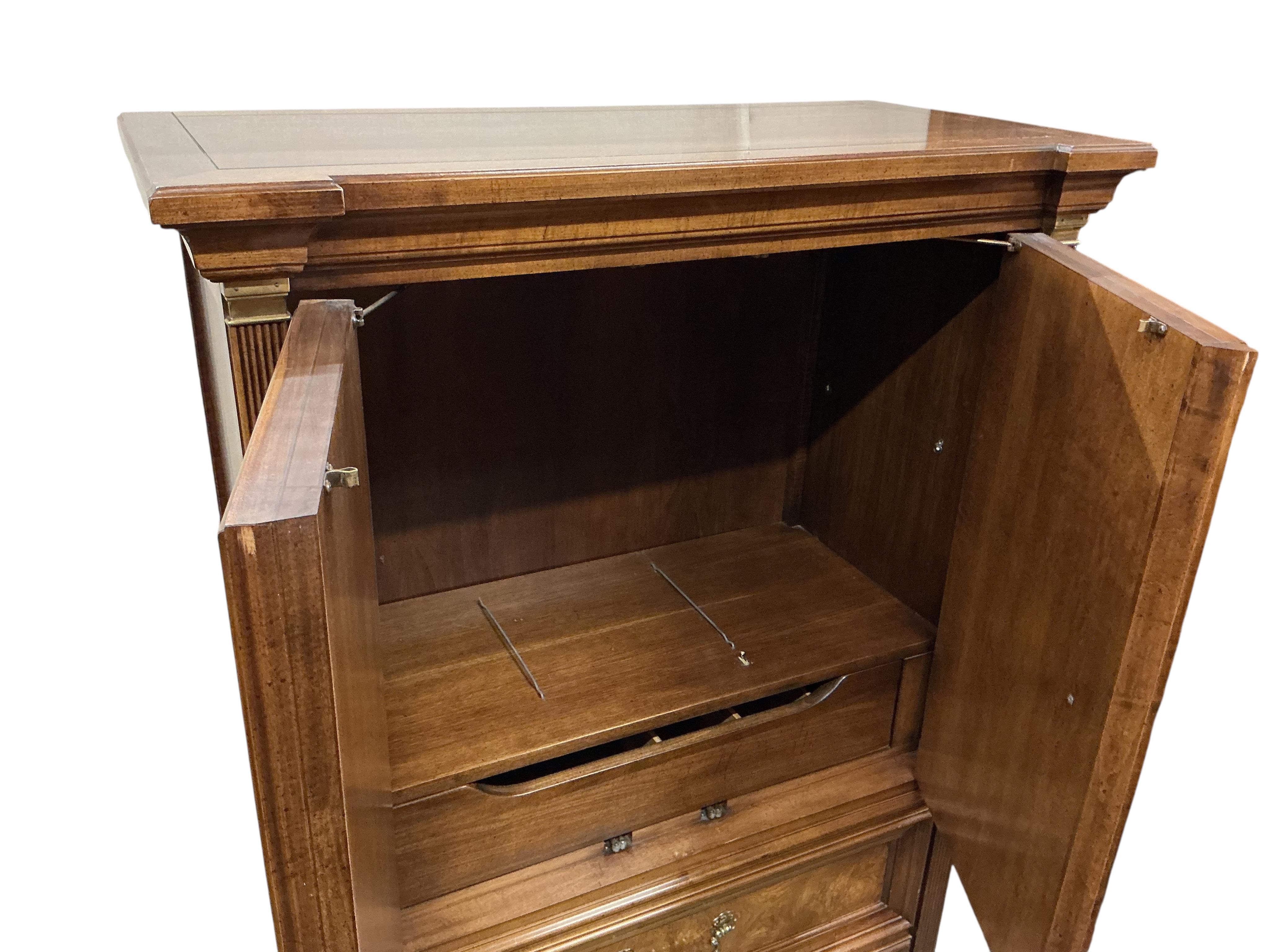 An American reproduction cedar and burr wood press cupboard, width 101cm, depth 50cm, height 154cm